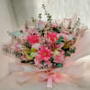 A mixed bouquet in pastel tones&mdash;a lovely and elegant arrangement featuring on-trend