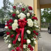 Wide and red standing spray 25 count Roses