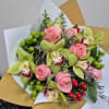 Bouquet of roses with orchids; the color of the orchids will depend