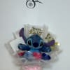 Blue plush toy bouquet with silk roses and birthday topper