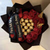 Red rose bouquet with Ferrero Rocher chocolates and black ribbon