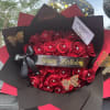 Luxury bouquet of 24 natural roses with a ribbon and personalized message.