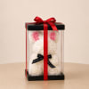 This charming bunny is made of white and blush foam roses with