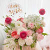 Florist choice of seasonal flowers in pink and white flowers theme. Or