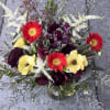A dreamy composition where velvety purples meet radiant golds and scarlet tones.