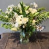 A serene mix of creamy whites and verdant greens, Soft Moss feels