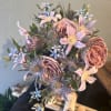 A couture palette of dusty mauve roses, lilac clematis, and cool blue
