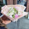 A hand-tied bouquet inspired by the softness and beauty of a blooming