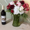 This beautiful mixed bouquet is paired with a bottle of Dale Hallow
