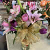 Lilies and tulips with a pop of greenery 