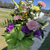 A mixture of spring flowers. Colors may vary. 