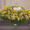 125 yellow roses arranged beautifully with greenery and babies breathe with granny&rsquo;s