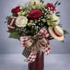 Roses of crimson and white with alstroemeria in a vase with Alabama