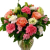 Pink and peach bouquet in a glass vase
