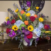 Their joy and exuberance will always be remembered. This classic urn arrangement