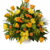 Yellow and orange rose bouquet with a ribbon in a white container