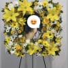 Remembrance flower (photo) frame standing arrangement including Yellow Oriental Liles, white poms