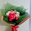 A cascade of lush pink peony-like blooms leads this cheerful, romantic flower