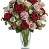 "Love her tender" with silky red, pink and white roses artistically arranged