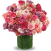Feminine and fabulous, this spectacular bouquet of lavender and pink roses in