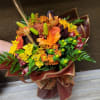 Wrap assorted flowers and other