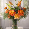 Sunlit orange and yellow roses take center stage in this Autumn Radiance