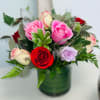 a bouquet made with the freshness of 12 roses in different colors