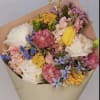 wrapped bouquet of fresh seasonal flowers