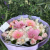 A bright and joyful bouquet, symbolizing warmth, positivity, and happiness. With their