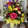 Designer will choose flowers based on this price point.