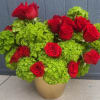 A bud and refreshing arrangement featuring vibrant green hydrangeas pairs with classic