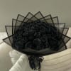 Black rose bouquet wrapped in geometric black paper