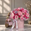 Beautiful personalized box with pink satin finishes accompanied by natural roses chosen