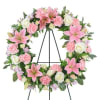 Whispers of Love Wreath is a graceful expression of love, remembrance, and