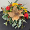 Autumn bouquet with red roses, yellow sunflowers, and burlap leaf accents