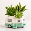 Bring the spirit of adventure indoors with this charming vintage camper planter