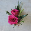 Bright pink spray rose boutonniere