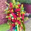 A tall, ceremonial standing arrangement designed to make a bold statement, perfect