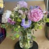 BEAUTIFUL ARRANGEMENT OF PEONIES, SURROUNDED BY WILDFOWERS LIKE: BUTTERFLY, SCABIOUS, STARFLOWERS BUBLEPERUM