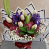 Deep, romantic color takes center stage in this flower arrangement-perfect as an