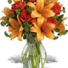 Ignite their heart with this inspirational gift of warm orange roses and