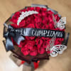 Bouquet of red roses with a black ribbon and butterfly decorations