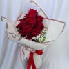 A timeless classic: 12 fresh red roses, carefully selected and wrapped in