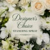 A serene standing spray designed for sympathy and memorial services, crafted to