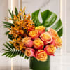 A bold tropical-inspired arrangement designed with radiant sunset tones and lush modern