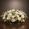 A low oval wedding centerpiece that reads as timeless elegance-Golden Garden is