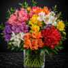 Colorful bouquet of alstroemeria in a clear glass vase
