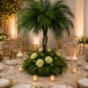 An architectural statement in green, Emerald Oasis is an event floral arrangement