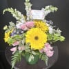 A bold yellow gerbera takes center stage in this cheerful birthday bouquet
