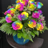 A bold, playful cluster of rainbow-dyed roses makes a joyful statement for